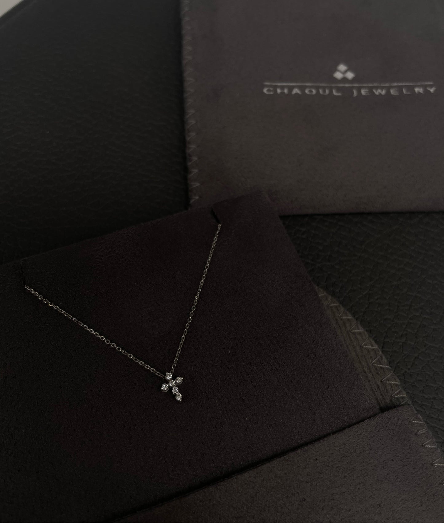 Mini diamond cross necklace